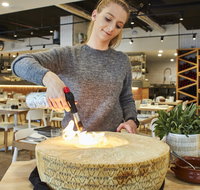 Flaming Cheese Wheel and Wine Pairing Experience - Pubs and Clubs