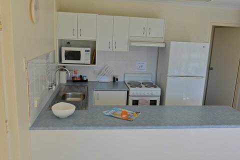 Beach House Holiday Apartments - Go Out 6